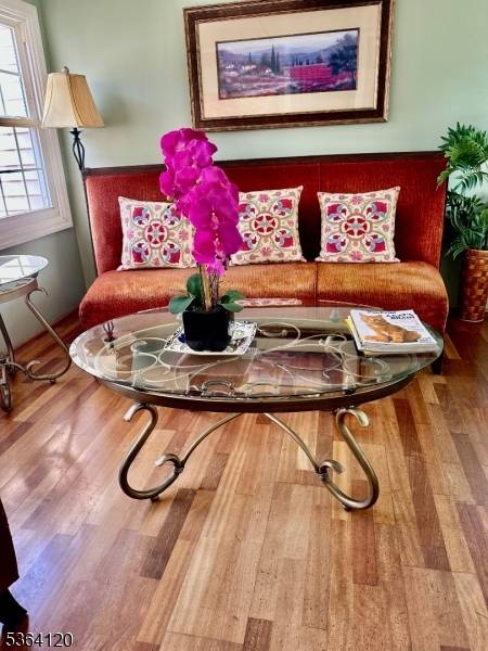 Welcome to this charming and spacious corner lot home featuring three generously sized bedrooms and two full bathrooms.