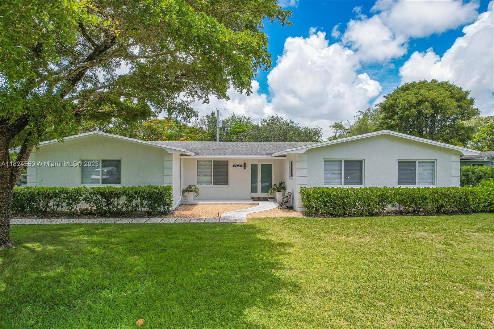 Discover this beautifully remodeled property in Palmetto Bay, featuring a spacious open floor plan that seamlessly combines comfort and style.
