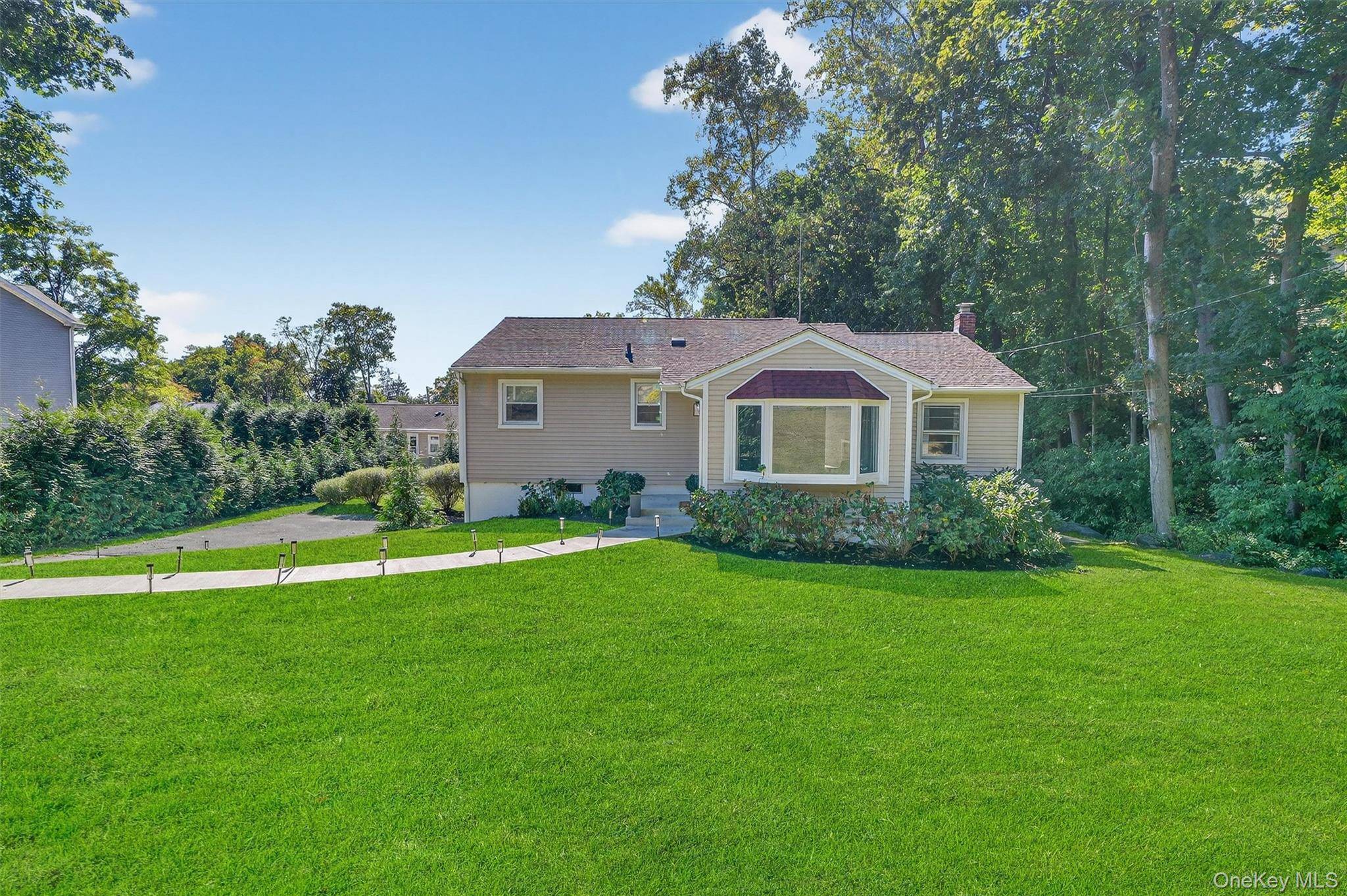 Welcome to this beautifully updated 3 bedroom, 2 bathroom ranch in the heart of Croton Village.