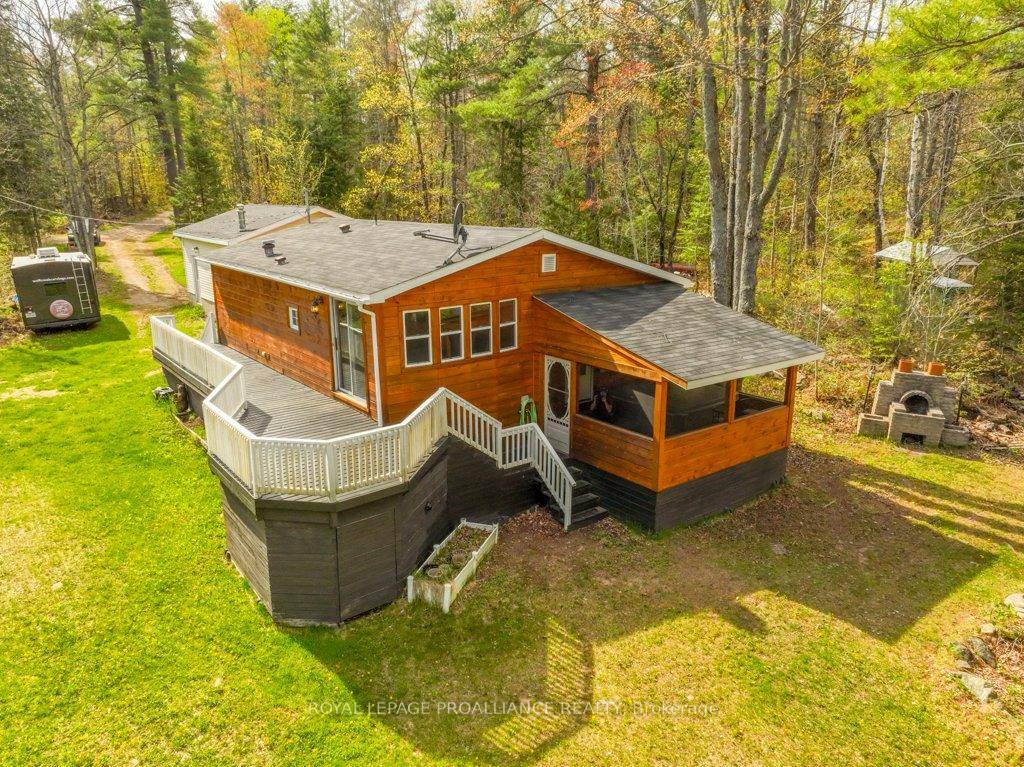 Discover your serene oasis on the breathtaking banks of the Skootamatta River with this charming 4 season recreational property, offering 164 feet of south facing waterfront on.