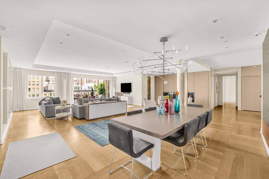 An Idyllic, peaceful penthouse designed with the colors of the ocean is a perfect retreat from city life.