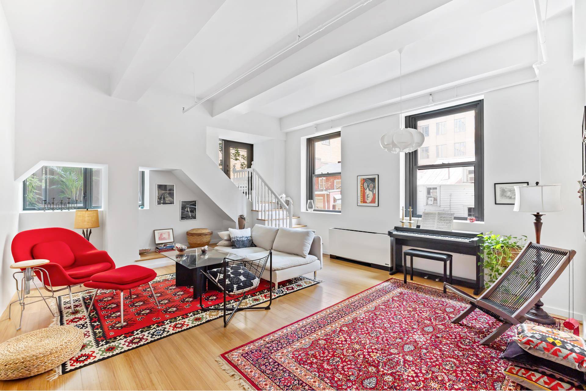 This oversized loft offers nearly 1800 square feet of living space with soaring 12 foot ceilings, three bedroom sleeping rooms plus den, two full bathrooms and a private terrace accessed ...