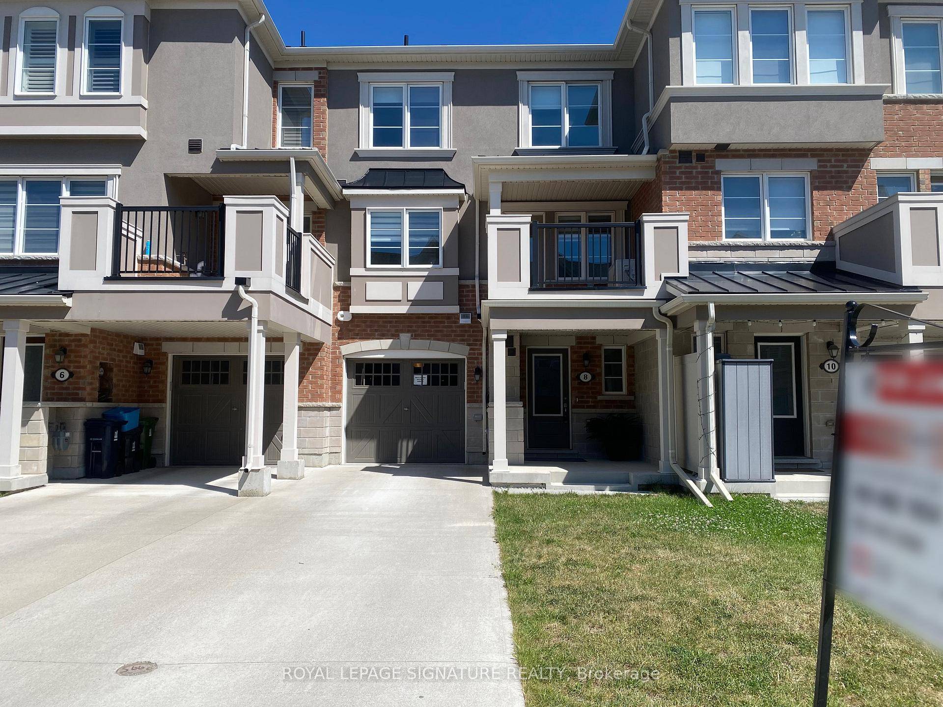 Elegant and bright 6 year old Townhouse has an open concept main floor with same floor walkout to deck with space for a BBQ.