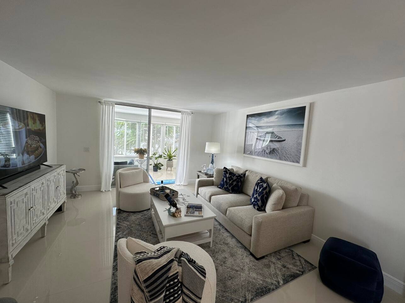 DEAUVILLE VILLAGE AT CUMBERLAND DR OFF ATLANTIC AVE AT DELRAY'S ONE OF A KIND CORNER END UNIT IS A LUXURY COMPLETELY RENOVATED 2 BR, 2BATH 1300 sf ft 55 UNIT.