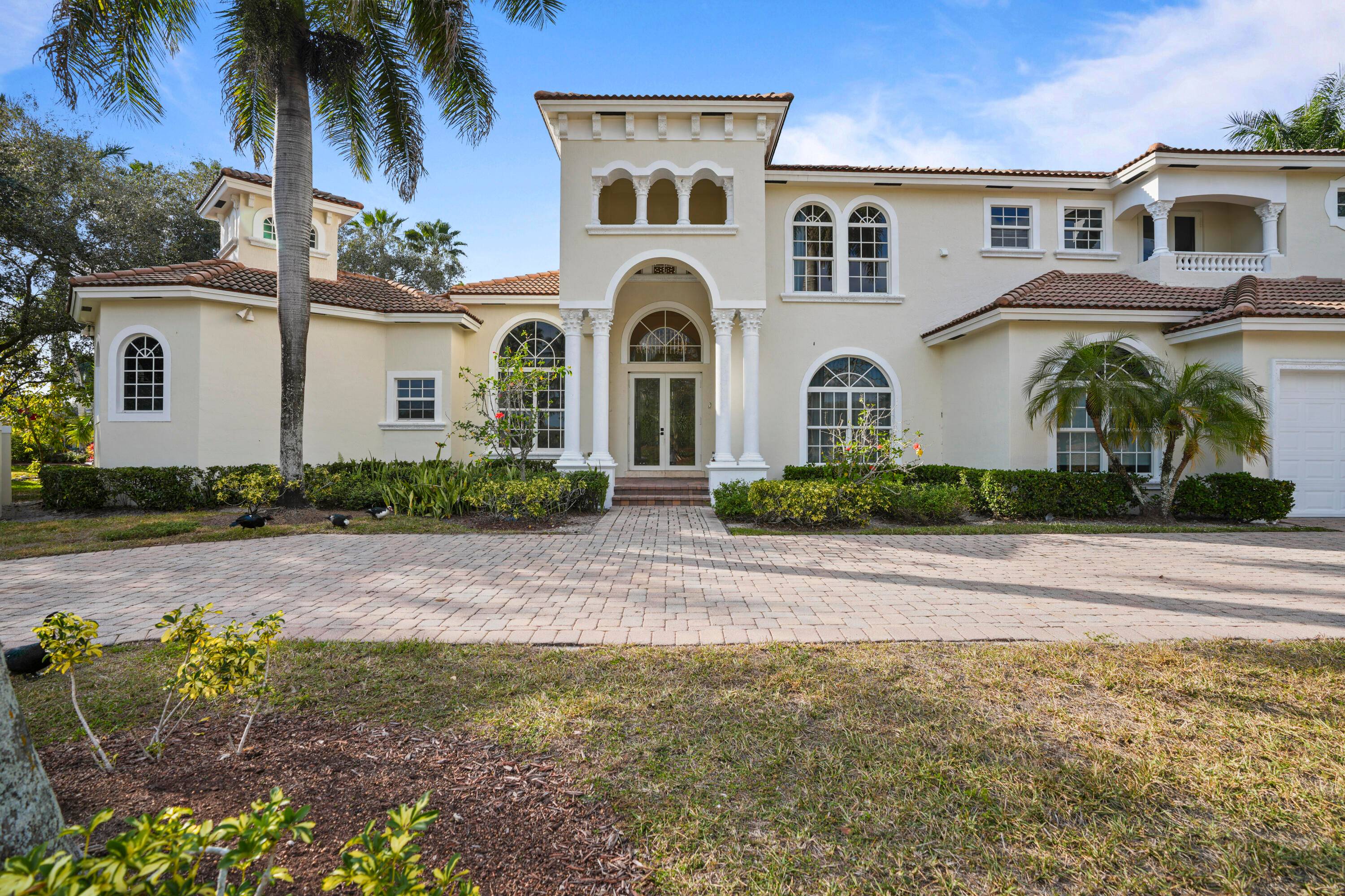 WELCOME TO 3201 E STONEBROOK CIRCLE, A LUXURIOUS VANDERBILT MODEL NESTLED WITHIN THE HIGHLY EXCLUSIVE GATED COMMUNITY OF STONEBROOK ESTATES.
