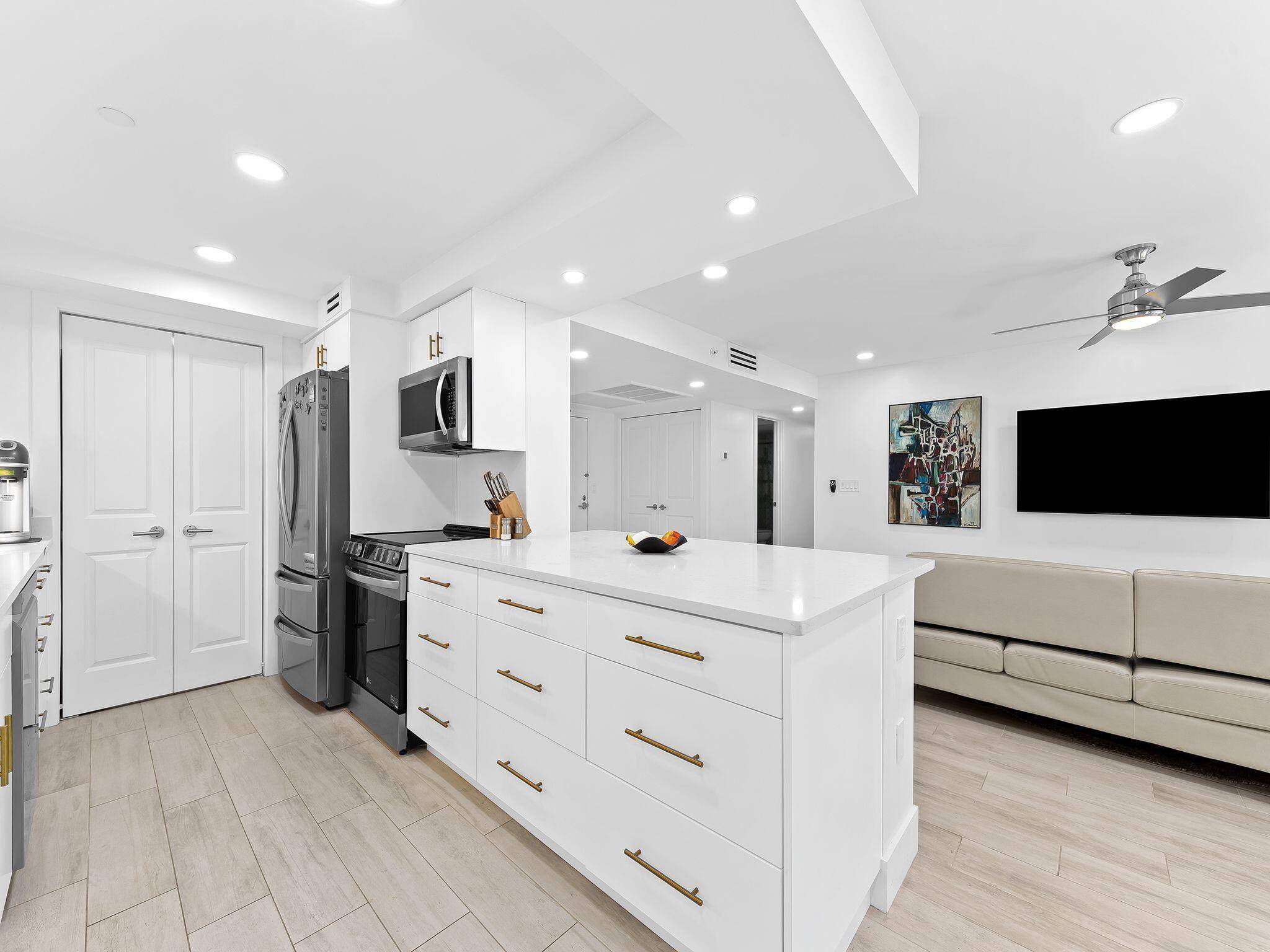 Beautifully remodeled with an open updated kitchen, stainless steel appliances and expansive living and dining area.