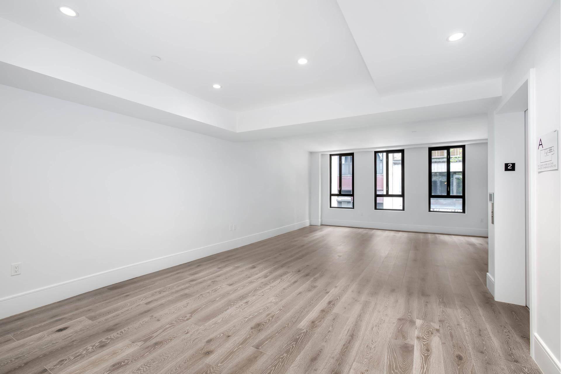 Boutique new development condominium completed in 2018 with common roof deck !