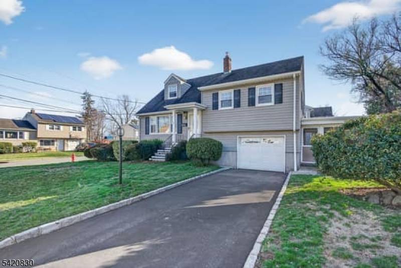 Welcome to this charming split level home, perfectly positioned on a corner lot in the highly sought after Patricia Place neighborhood of Clifton, New Jersey.