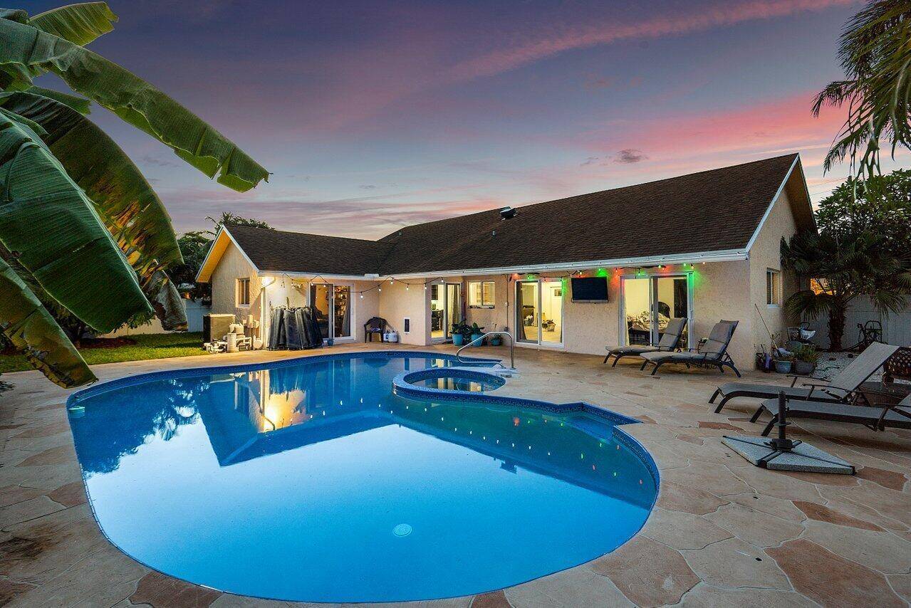 Beautifully updated 4 bedroom pool home in East Delray Beach !
