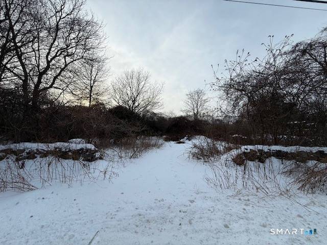 Set along sought after Montauk Avenue in Stonington, this exceptional 1.