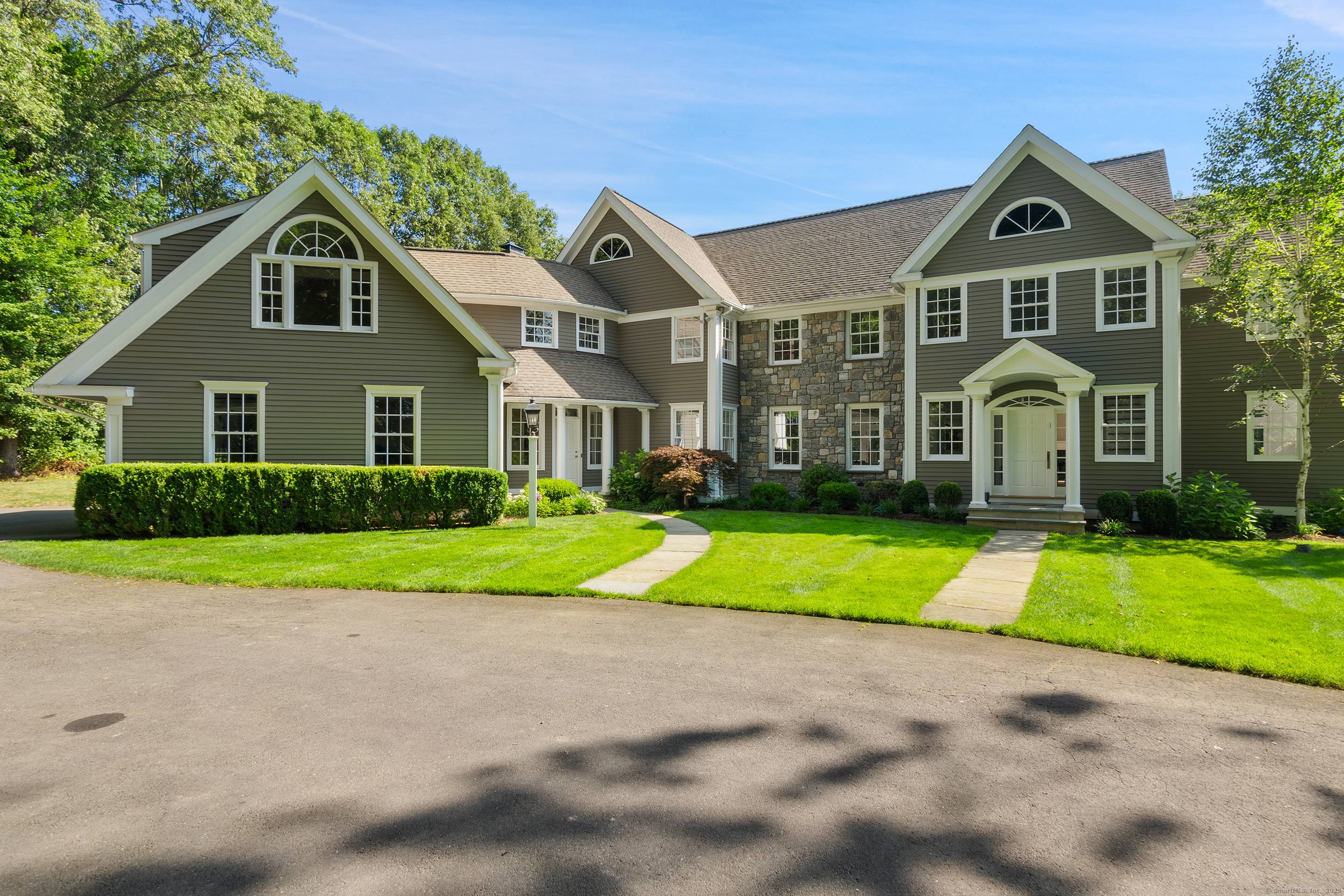 This spectacular residence blends timeless elegance with modern sophistication, having been meticulously updated with the finest finishes throughout.