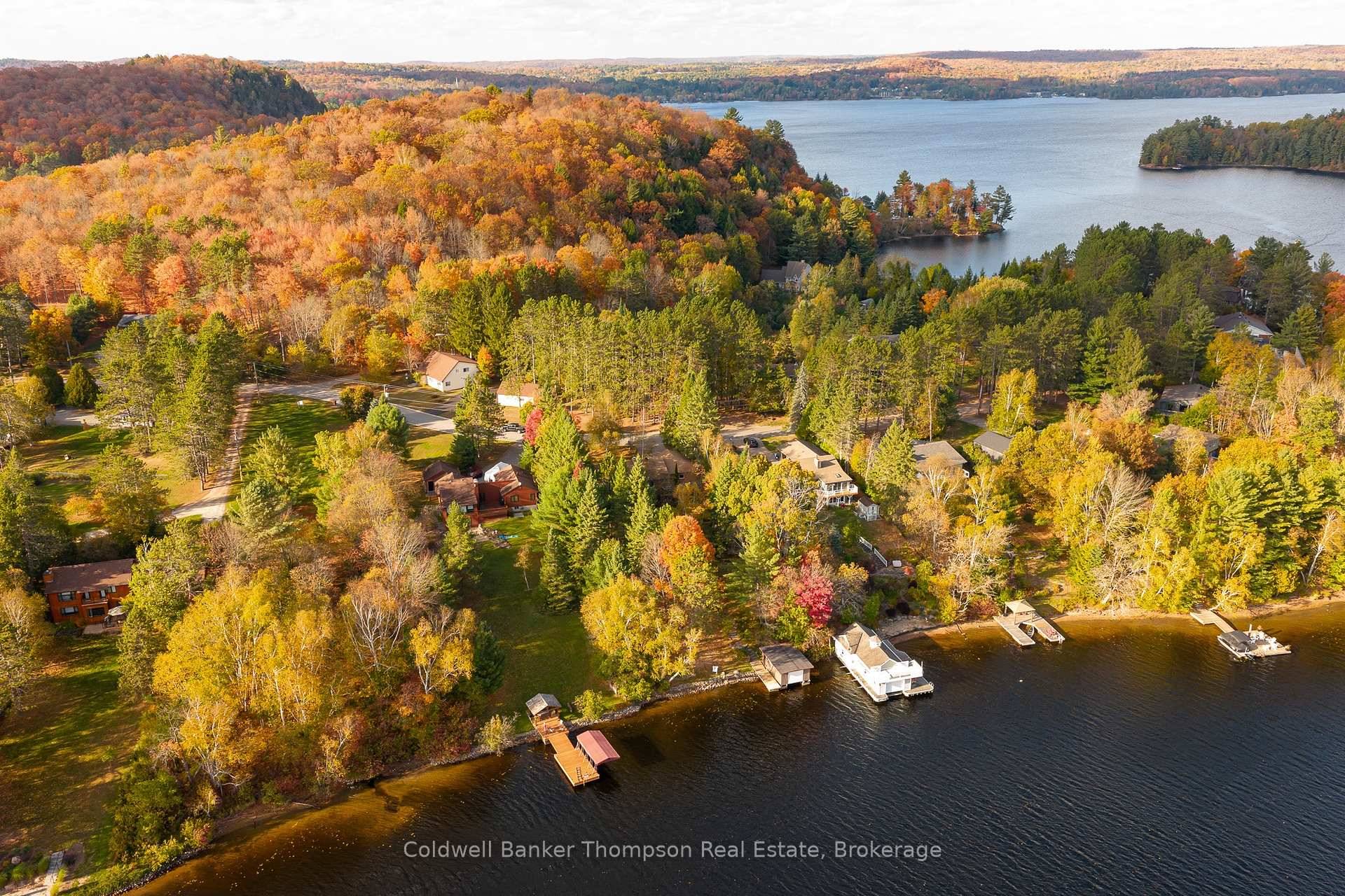Tucked into a mature amp ; desirable neighbourhood on the shores of Fairy Lake, this classic brick bungalow offers a rare combination of natural beauty, sought after location, amp ; ...