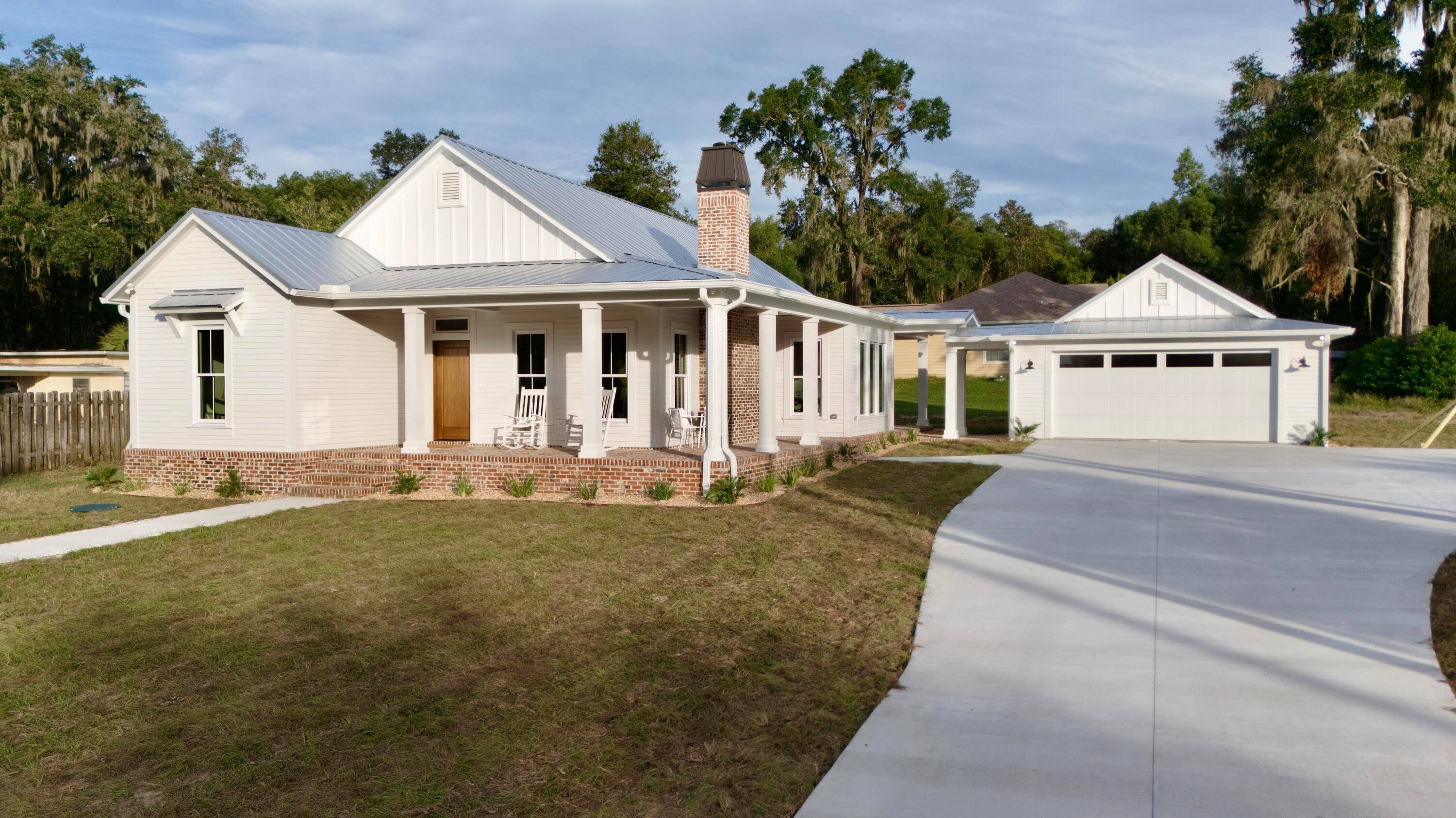 This quintessential brand new custom built home has all of the charm replicating the local historical homes of High Springs, Florida.