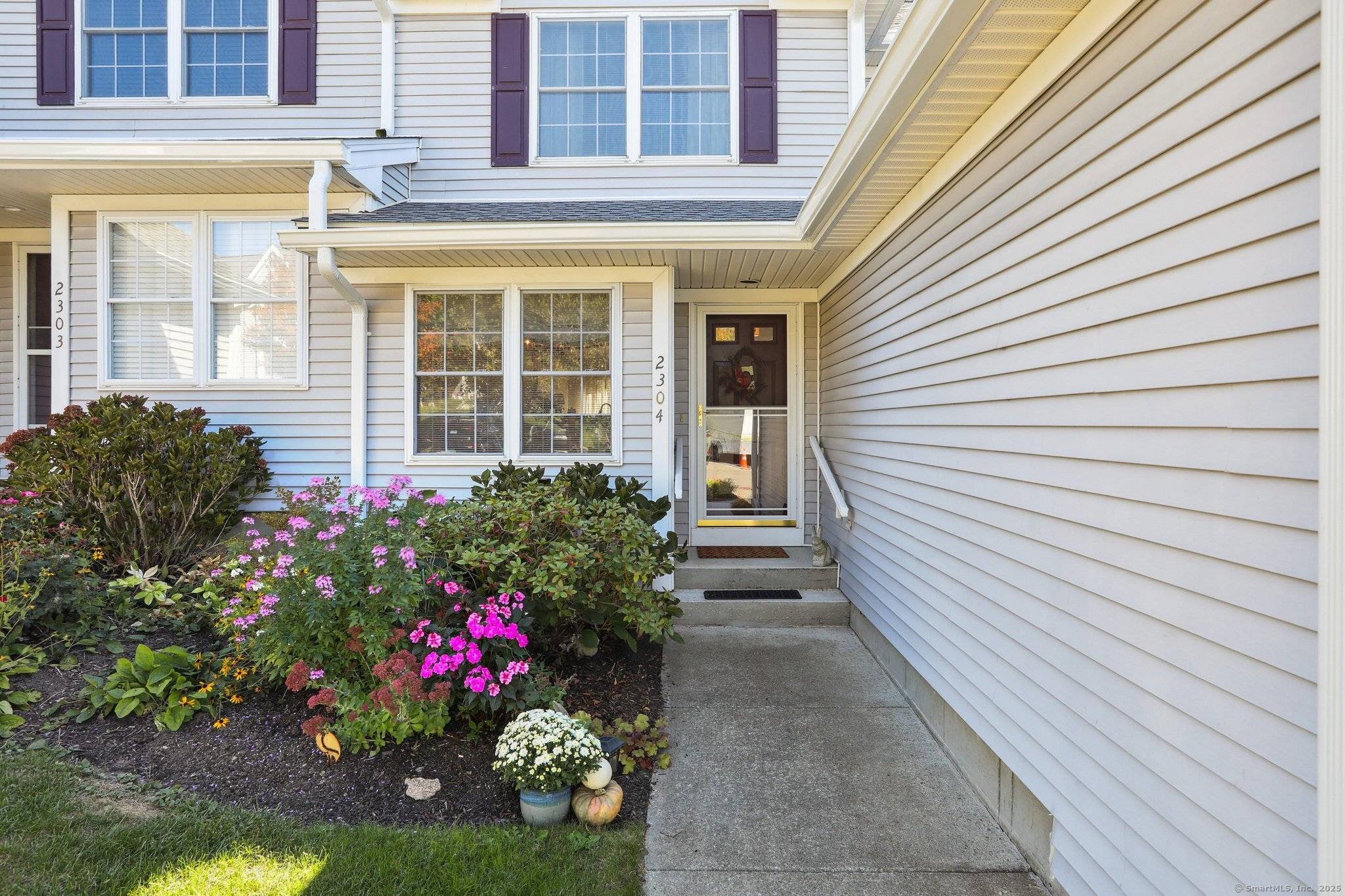 Beautiful Tri Level Townhouse, with 2 bedrooms, 3 1 2 Baths, and a beautifully finished lower level.