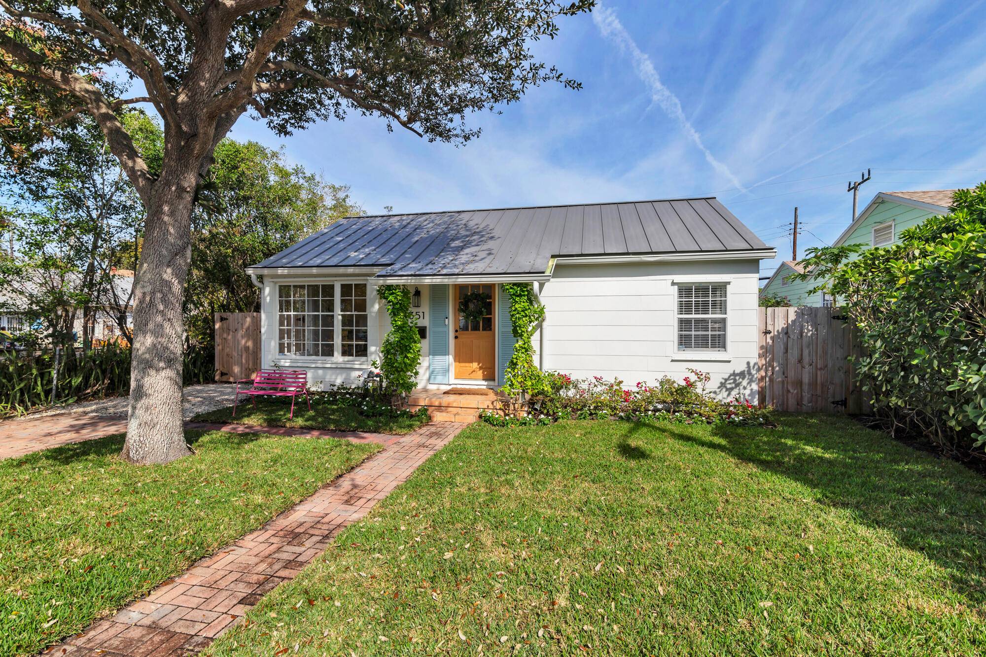 Old Florida charm abounds at this 1940s Key West cottage with the storybook style of a bygone era but all the updates for modern living.