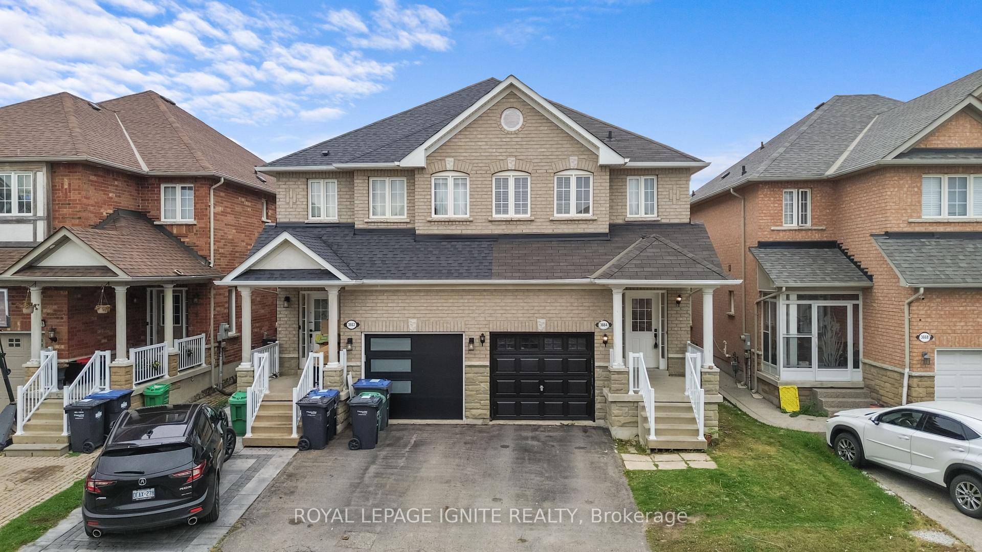 Spacious 3 bedroom semi with Main Floor Open Concept, 9 Ft Ceilings On Main Level, 2nd Flr W Computer Alcove, Fits 2 Cars.