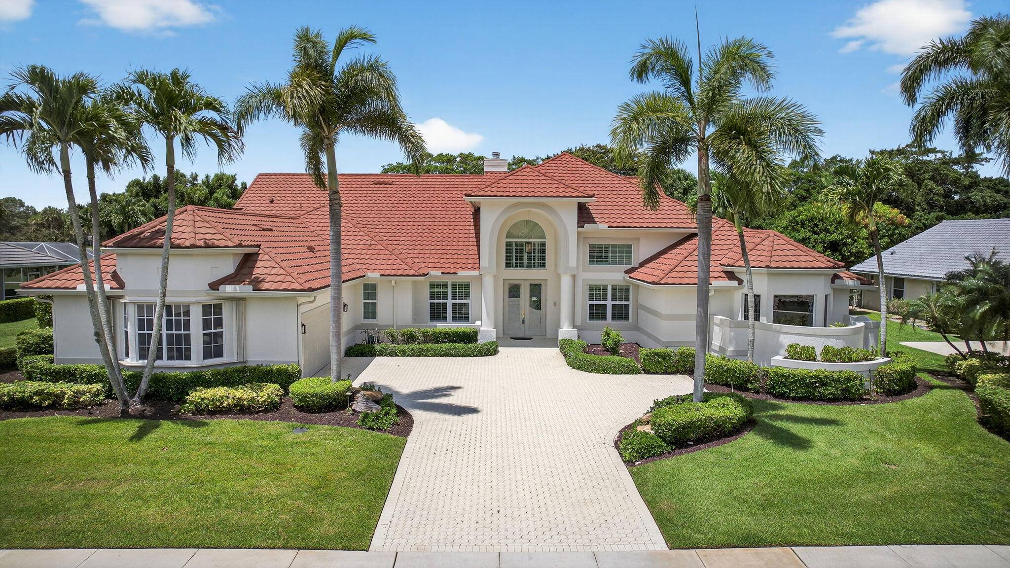 Welcome to this beautifully upgraded and impeccably maintained home in the heart of Wellington, with low HOA fees, and top tier features throughout.