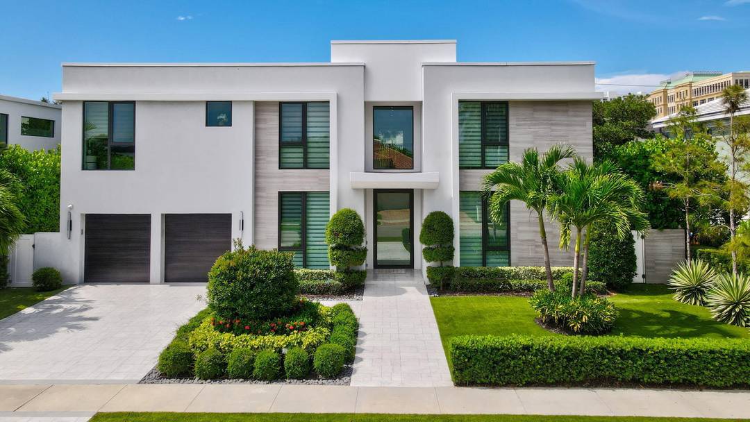 Situated in one of East Boca Raton's most coveted neighborhoods, this five bedroom, five and a half bath contemporary estate lies just steps from Mizner Park and moments from the ...