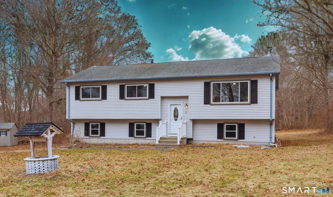 Welcome to 33 Deer Ridge Road, where comfort, privacy, and endless possibilities join together.