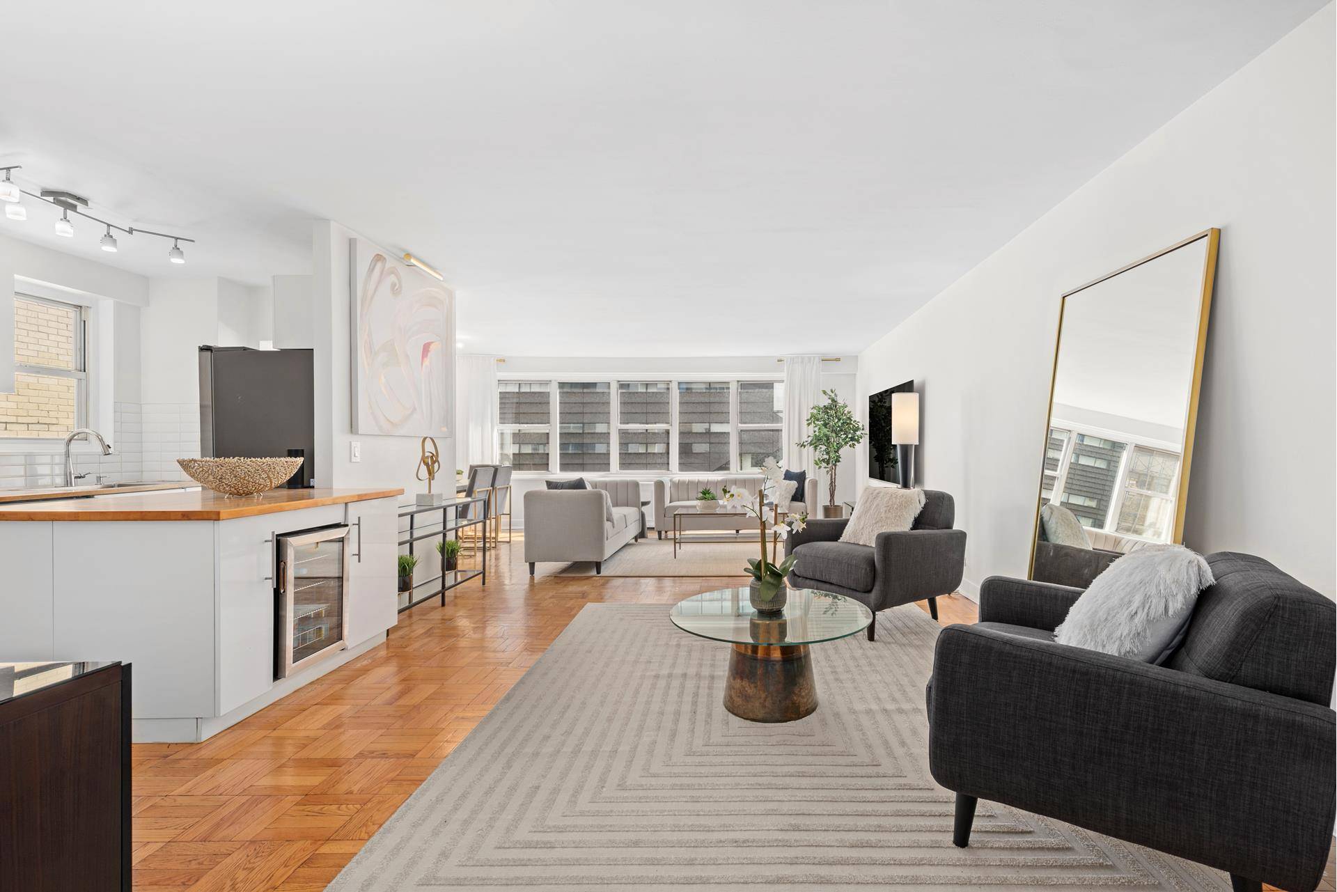 Enormous Fifth Avenue two bedroom one block from Union Square with two full baths, amazing closets, open kitchen, and full time doorman !