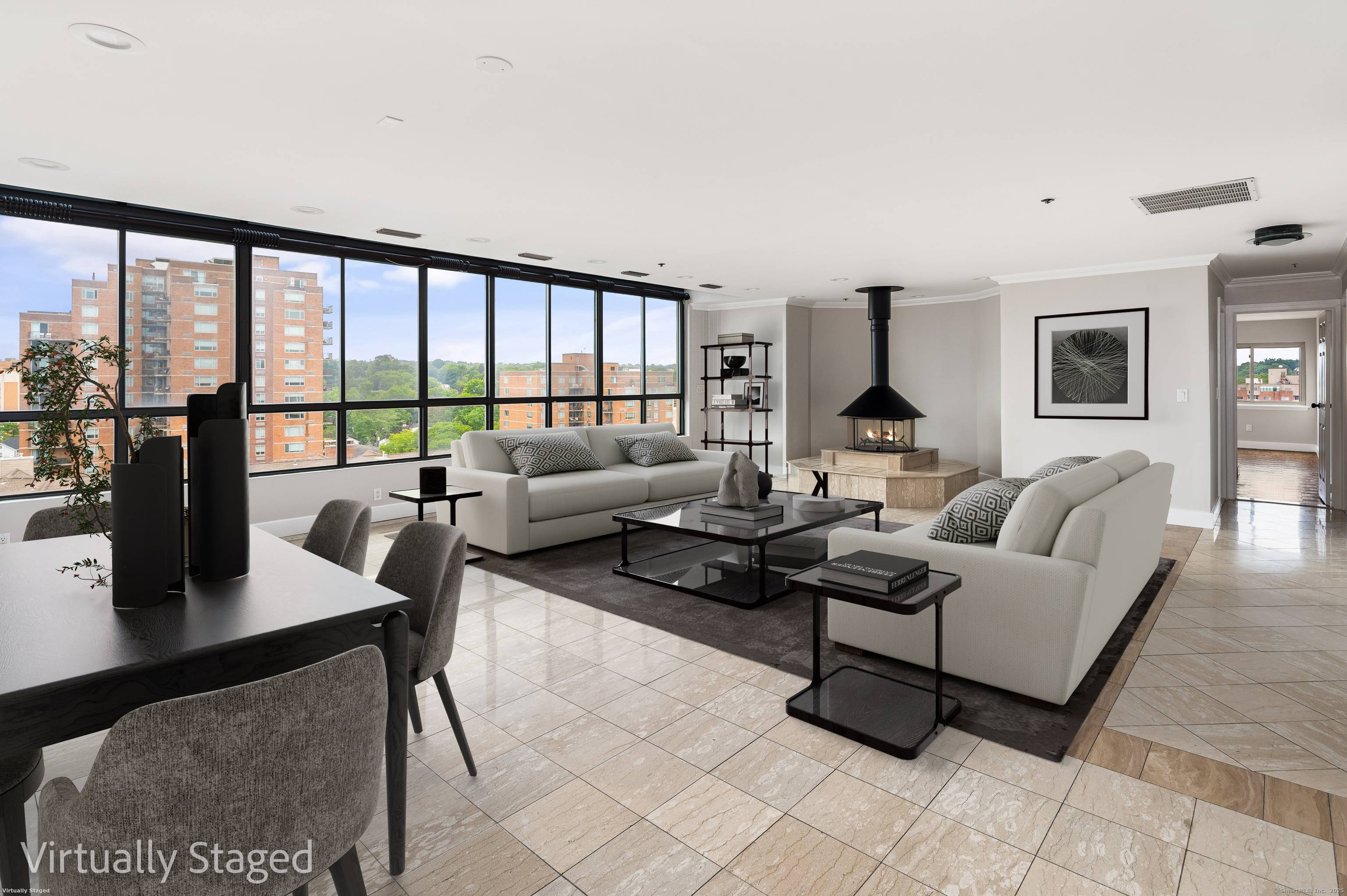 Welcome to an exceptional opportunity to own a rarely available, move in ready top floor penthouse in a gated community just minutes from downtown Stamford.