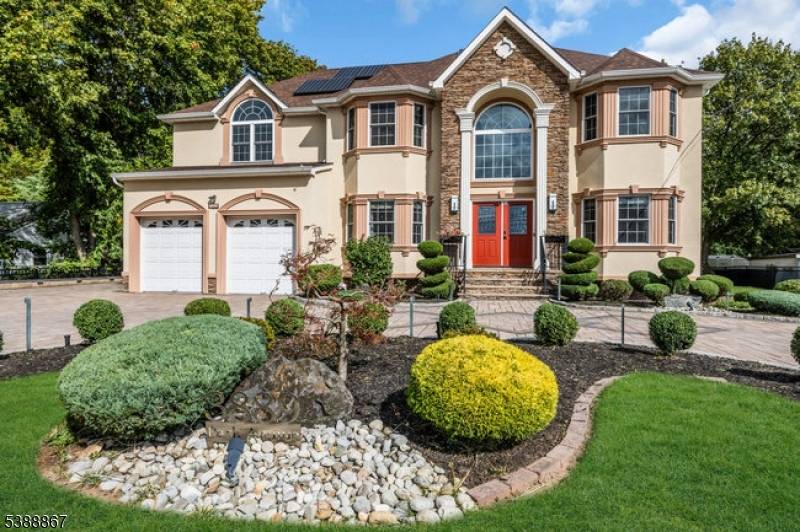 This magnificent custom colonial home, built just eight years ago, blends modern luxury with timeless design.