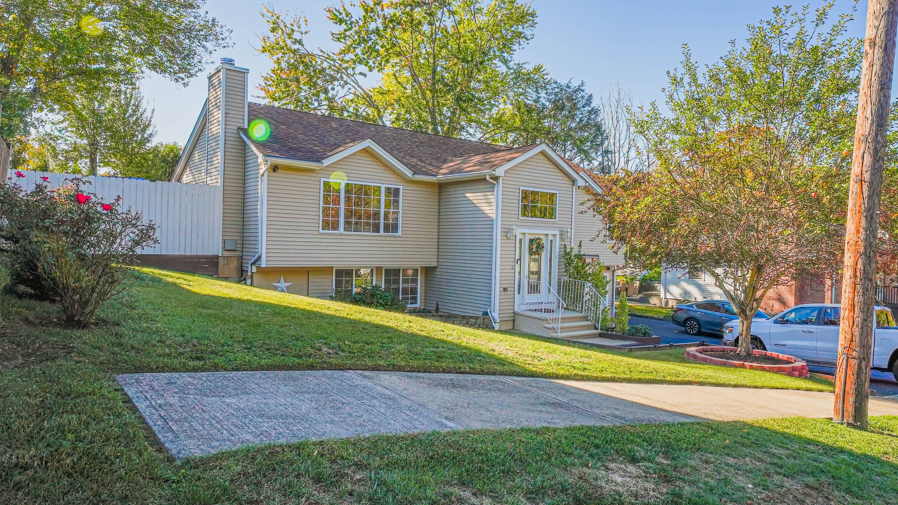 This custom built, raised ranch style single family home at 100 Yates St, West Haven, CT 06516 is noted for being beautifully maintained and is a bright, turn key residence.