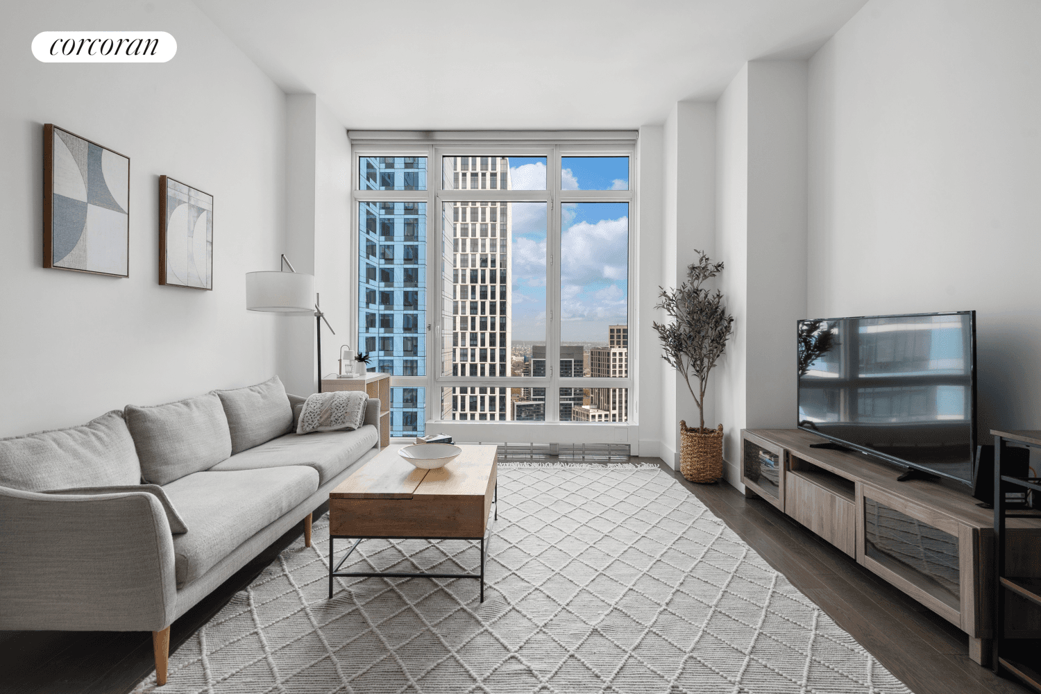 Residence PH45F is a stunning one bedroom, one bathroom luxury penthouse condo featuring over eleven foot high ceilings, wide plank oak floors, and upscale hardware and fixtures.