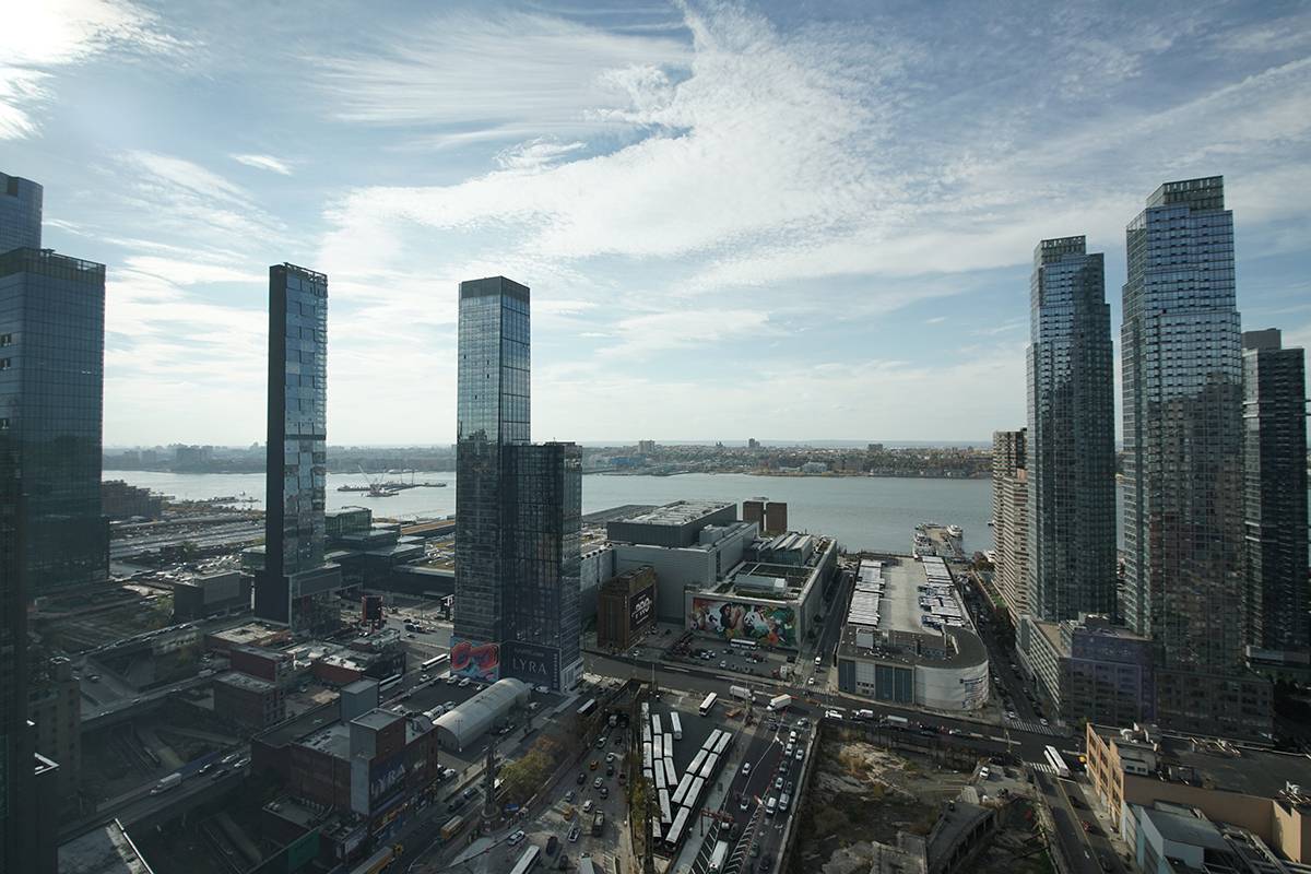 With sweeping views of the city from sunrise to sunset 555TEN towers over the new West Side.