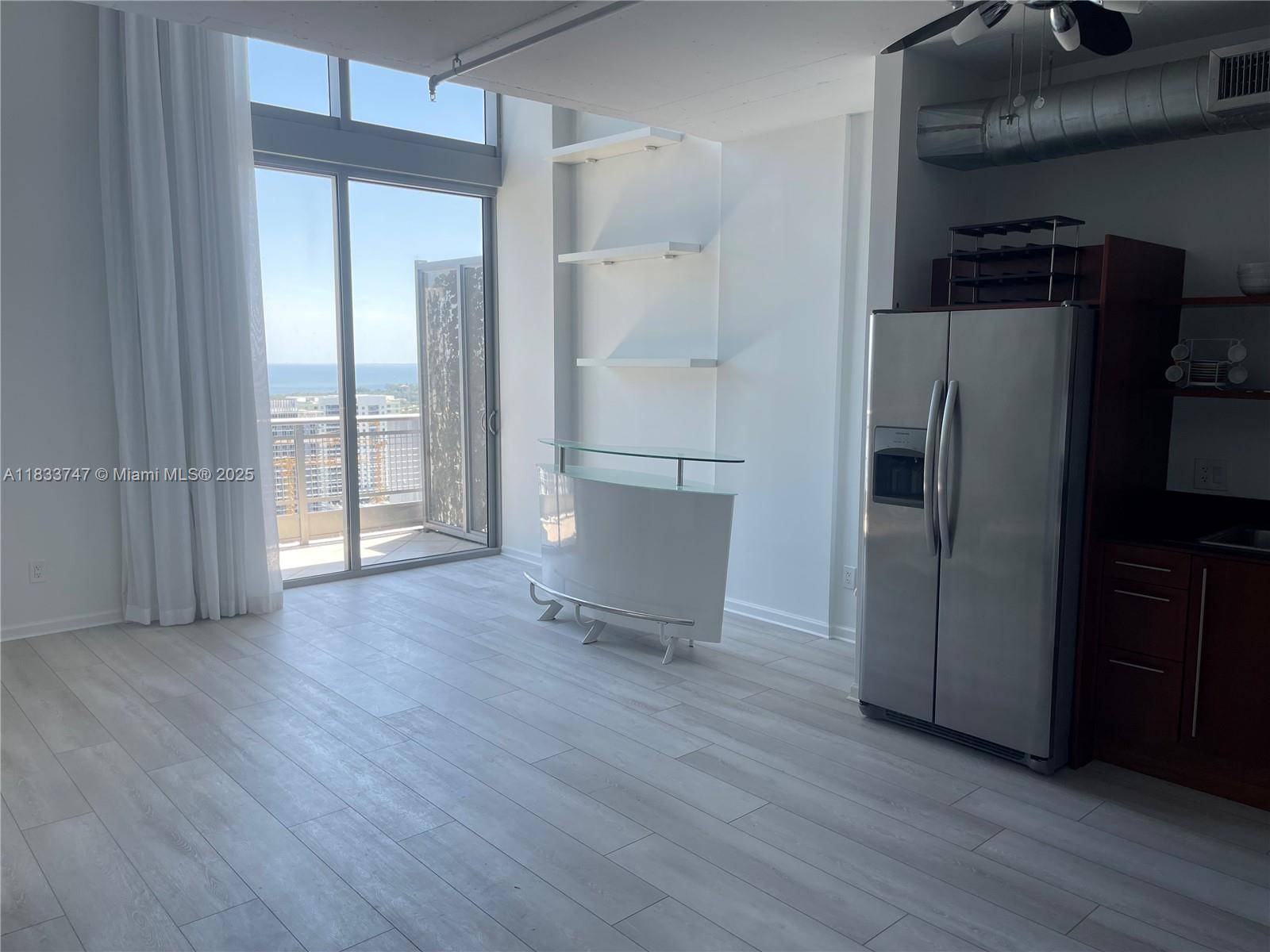 XPERIENCE THE BRICKELL LIFESTYLE AT THIS RECENTLY REMODELED PH 2 BED 2 BATH PLUS DEN AT THE NEO VERTIKA.