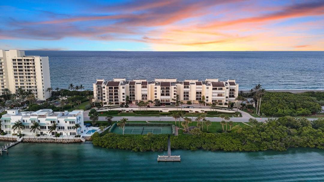 Experience luxury Intracoastal front living on exclusive Jupiter Island in this fully remodeled 3BR 3BA residence at Seawatch.