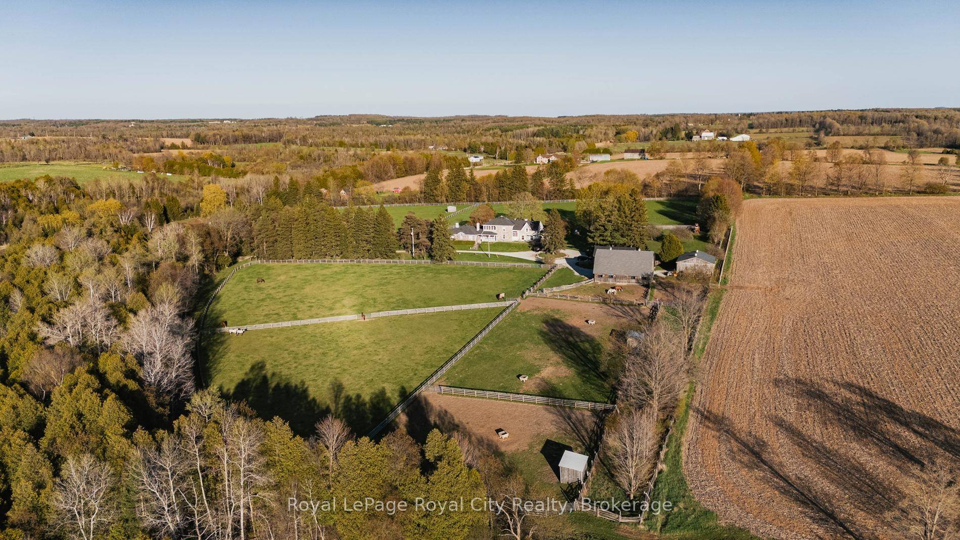Nestled on a picturesque lot in the charming small town of Erin, this exquisite estate spans 71.