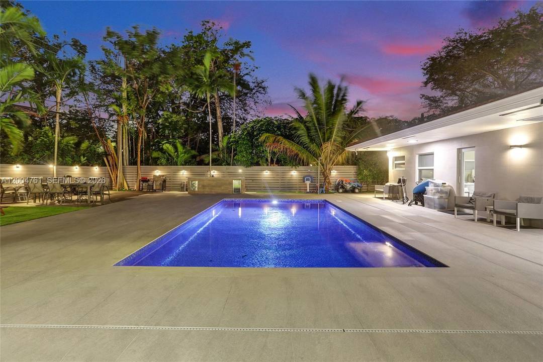 Welcome to this beautifully maintained modern one story home in the sought after Skylake neighborhood of North Miami Beach.