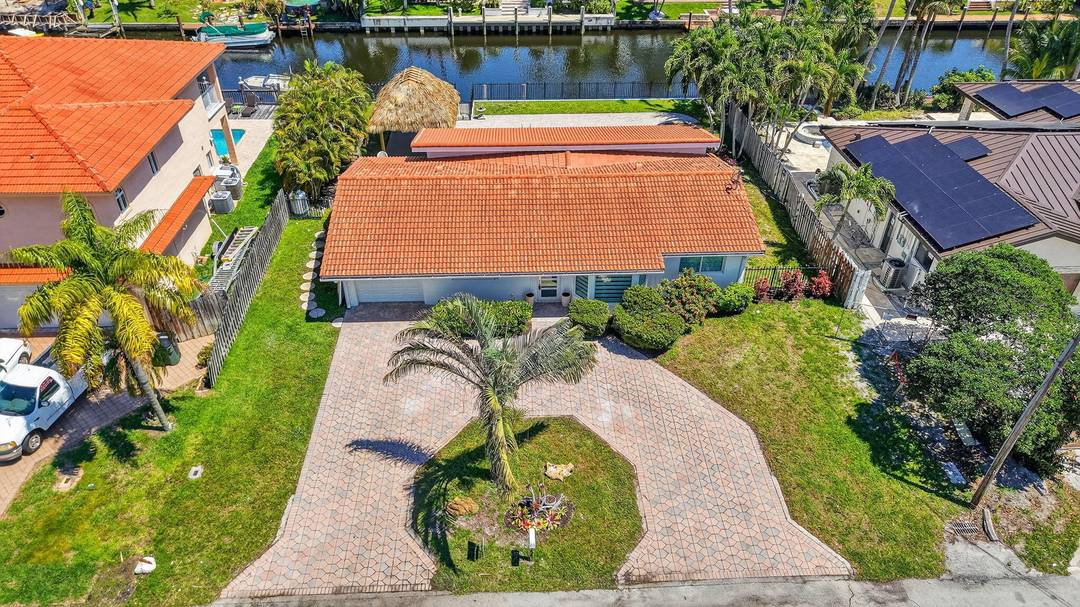 Fabulous waterfront single family pool home with private dock and ocean access.