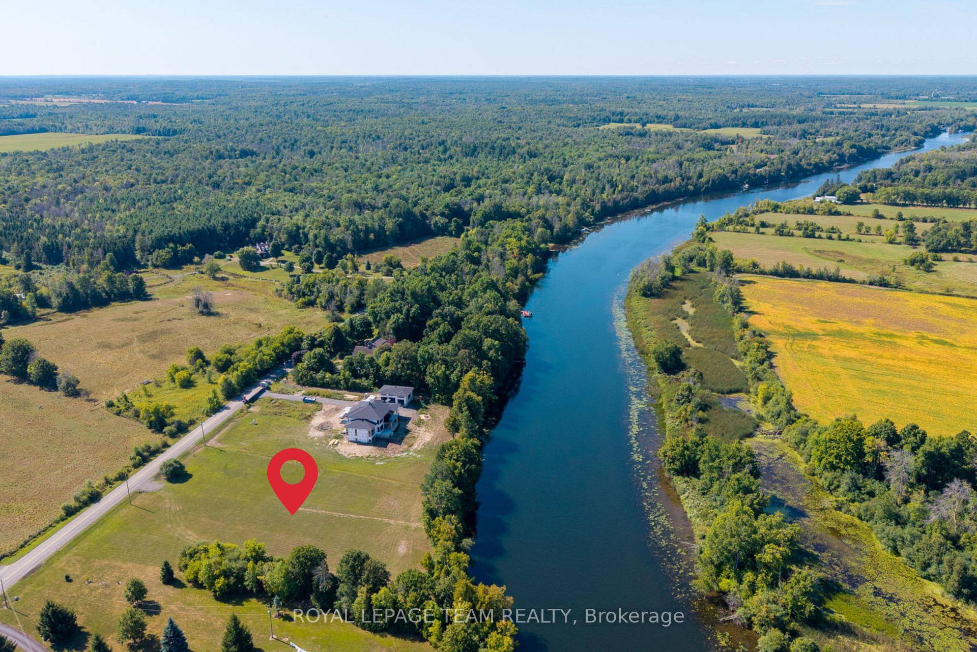 2. 3 ACRE WATERFRONT VACANT LOT INCLUDING DOCK SYSTEM A rare opportunity to create your dream home on a spectacular, build ready lot with over 275 ft.