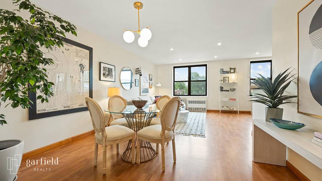 Sprawling combined units create this exceptionally large three bedroom, two bath home offering 1, 895 square feet of bright, sun filled living space on the third floor of a well ...