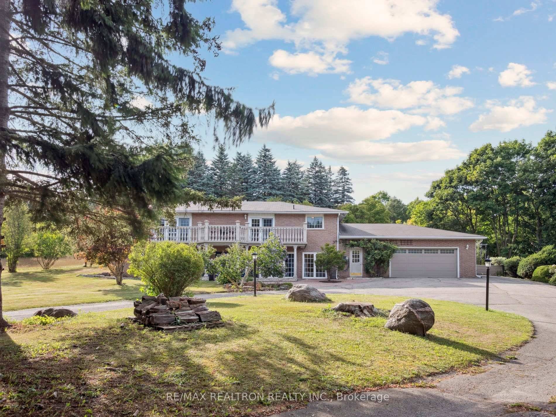 Welcome to this incredible property, nestled on a stunning, private 1.