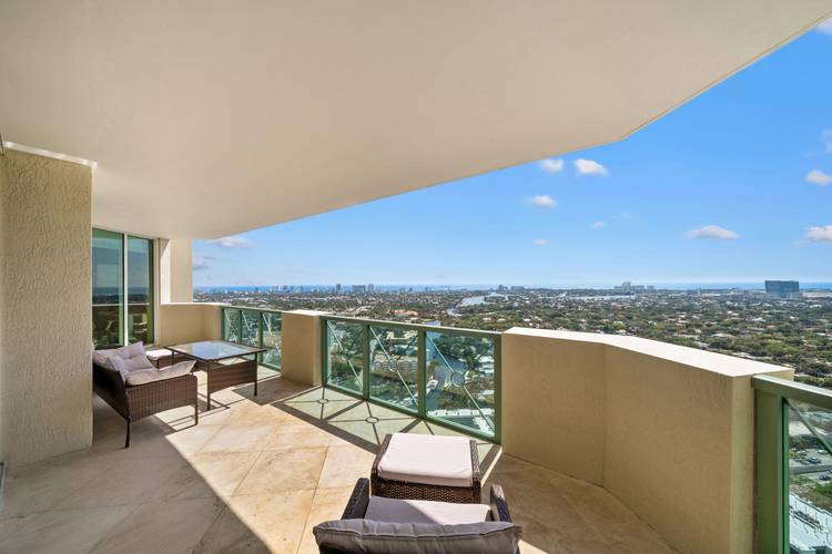 Live above it All ! This showcase residence is elevated above the city with sweeping ocean, Intracoastal and River Views, overlooking the city skylines of the south Florida Coastline.