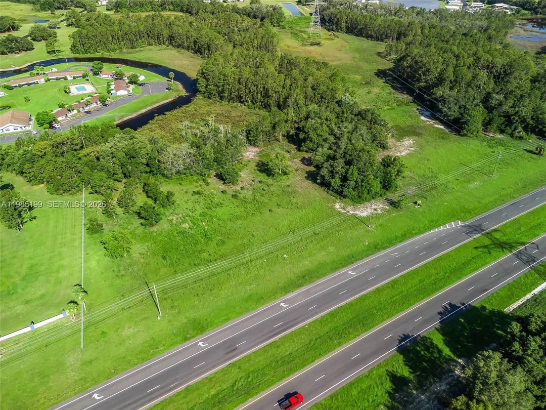 Discover 5. 75 Acres of Prime Developable Land on US Highway 27 Leesburg, FL.