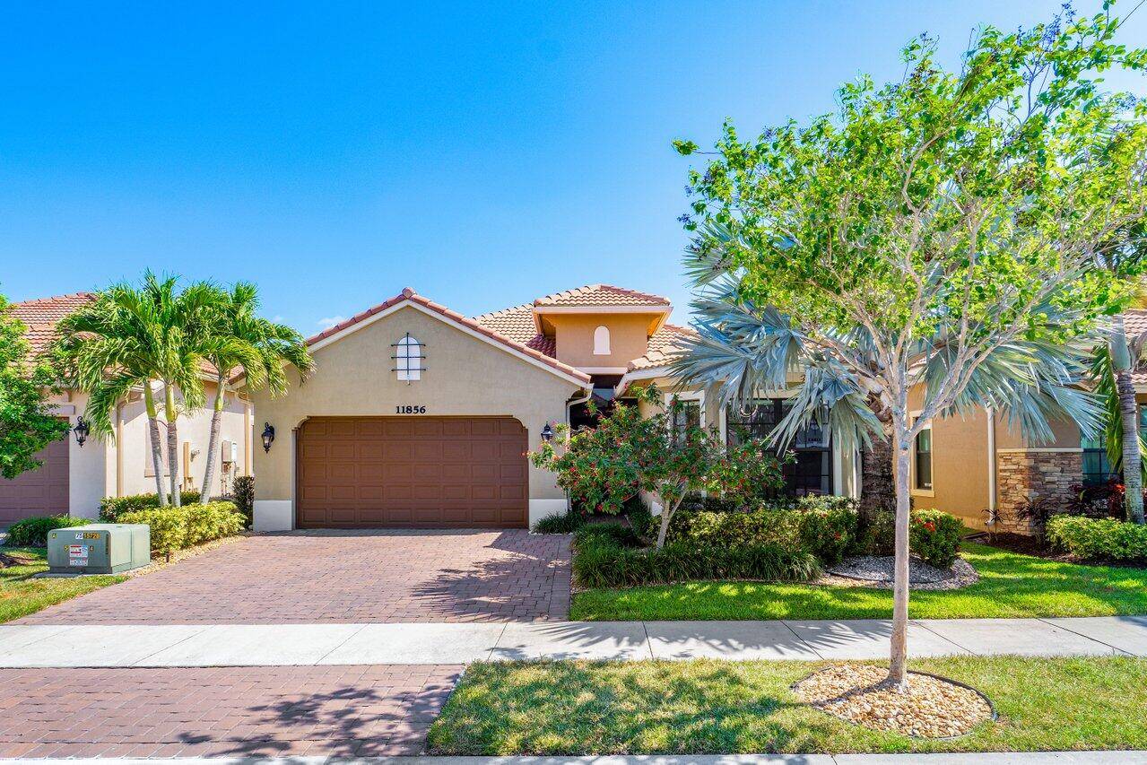 Welcome to your dream home at 11856 Leon Circle, Parkland, FL !
