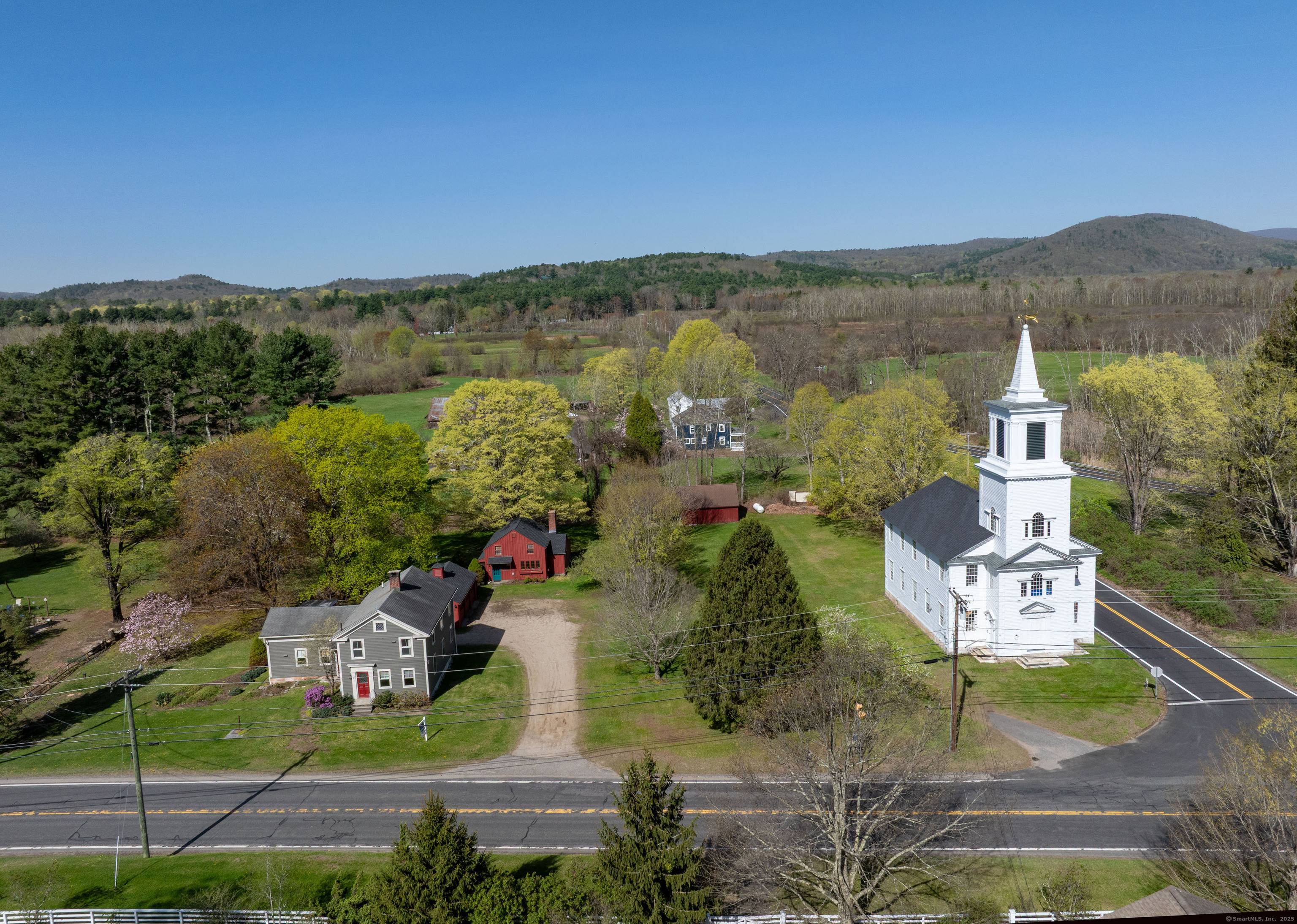 This listing features two beautifully maintained antique homes, both situated on separate parcels, with both properties included in the sale.