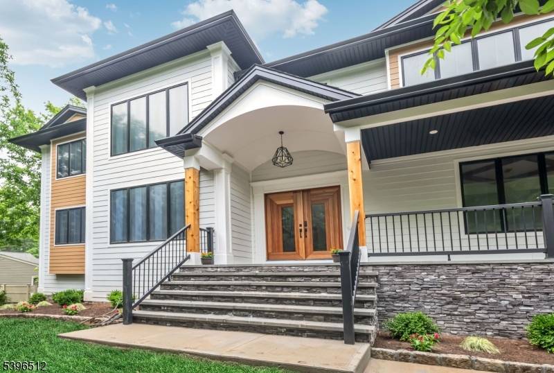 Welcome to this stunning new construction 5 bedroom, 5.