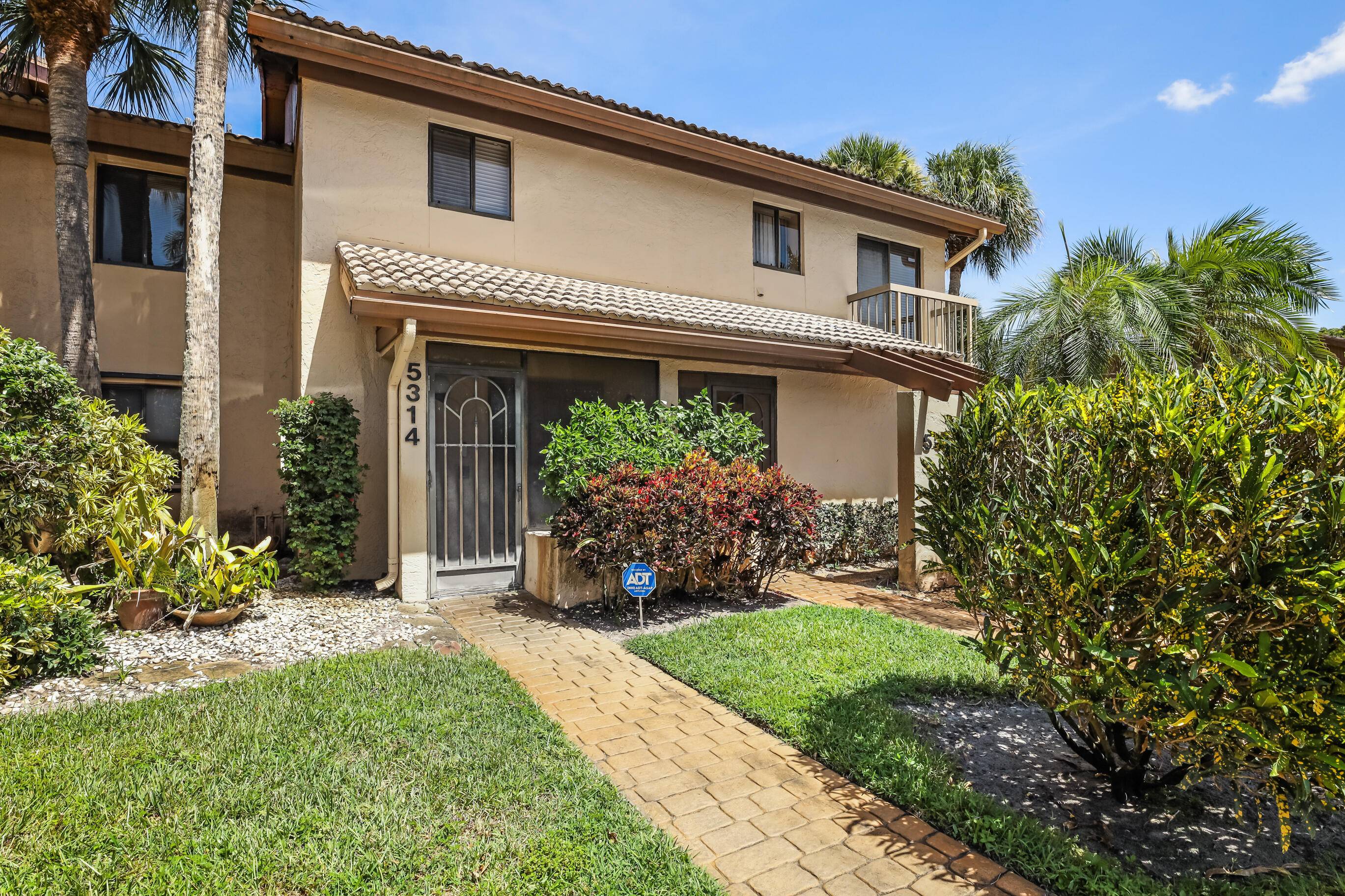Step into this light filled 2 bedroom Den, 2 bath condo in the sought after gated community of The Fountains !