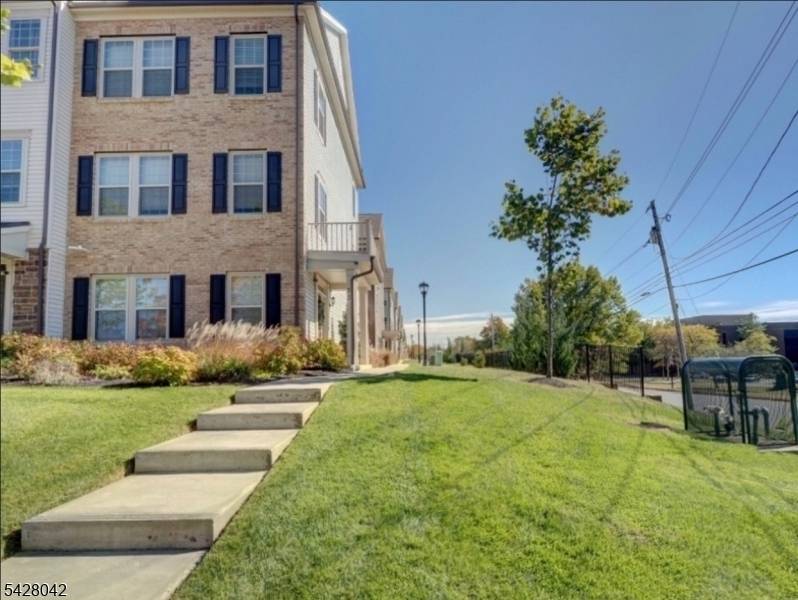 Welcome to this beautiful end unit townhome in desirable Livingston Square !