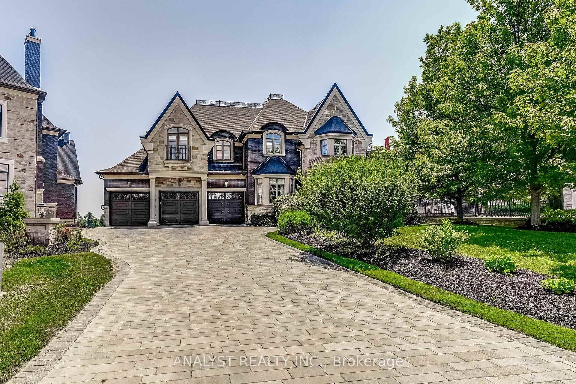 New Price ! Discover this exceptional custom built residence located in the prestigious On the Boulevard enclave in Kleinburg.