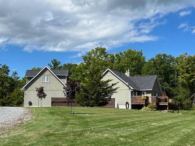 Picture perfect and perched on a hill with sweeping views of over 6 acres, this rare find is truly move in ready.
