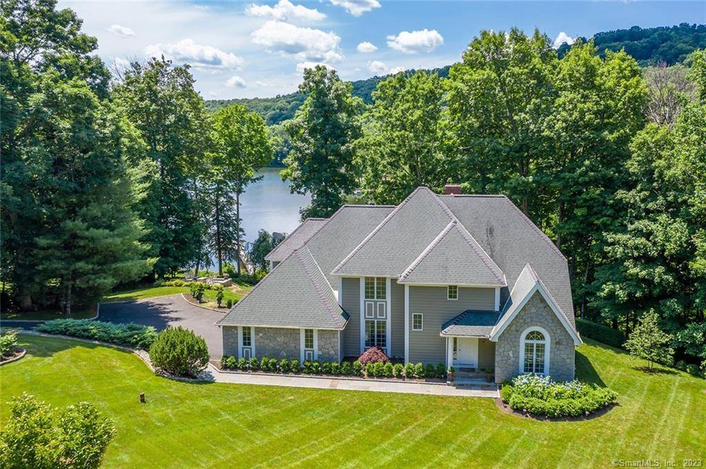 Privately set, Sail Harbour Waterfront offers enticing south exposure, multi level decks w glass rails for unobstructed views, terraced gardens w intimate seating in an idyllic 1.
