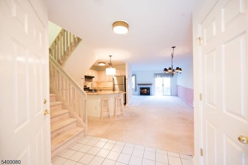 Nestled on a quiet cul de sac, this townhome offers great privacy with no rear neighbors and a beautiful layout with a gas fireplace in the living room.