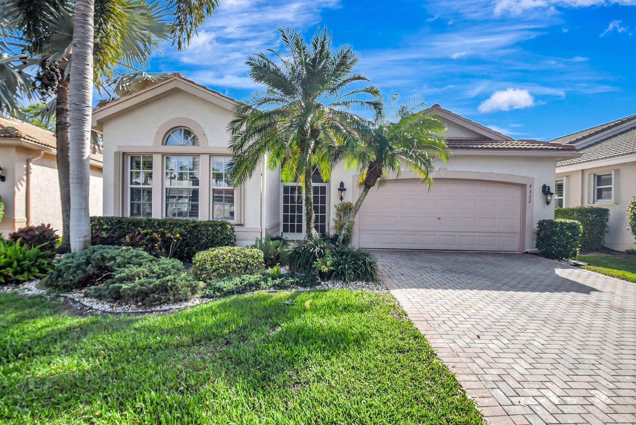 COME SEE THIS LOVELY MEDITERRANEAN MODEL WITH THE WALL DOWN BETWEEN THE LIVING ROOM AND FAMILY ROOM WHICH CREATES OPEN LIVING CONCEPT.