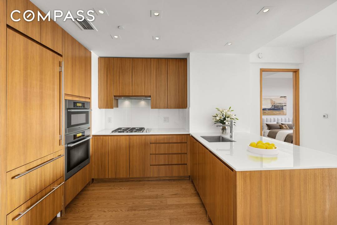 Perched high on the 37th floor, this luminous 1, 168 square foot 2 bedroom, 2.